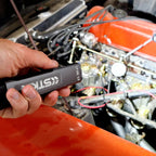 LP-EDC 5.0 Low Profile Everyday Carry "Flat" Flashlight shining light on a vehicle engine bay