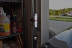 Adjustable side parking sensor mounted to a garage door track