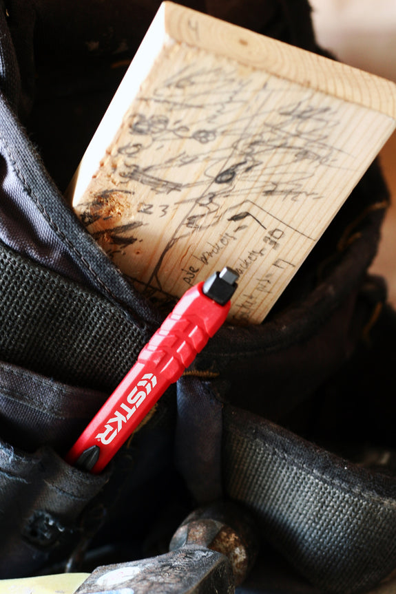 STKR Mechanical Carpenter Pencil in a carpenter's tool pouch